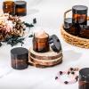 imageDomensi 72 Pcs 2 oz Glass Jars with Lids Travel Size Round Leakproof Empty Cosmetic Jars with Inner Liners Lid for Storing Makeup Lotions Face Cream Ointments Candle DIY Making BlackAmber