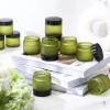 imageDomensi 72 Pcs 2 oz Glass Jars with Lids Travel Size Round Leakproof Empty Cosmetic Jars with Inner Liners Lid for Storing Makeup Lotions Face Cream Ointments Candle DIY Making BlackPea Green